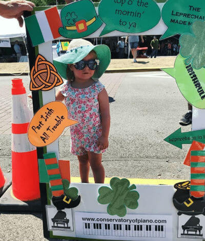 A young girl posing for a fundraiser photo