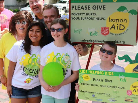 a group of conservatory students at a fund raiser, raising money for LemonAid Foundation
